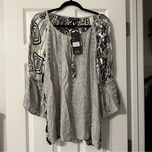 Boutique top with detailed back